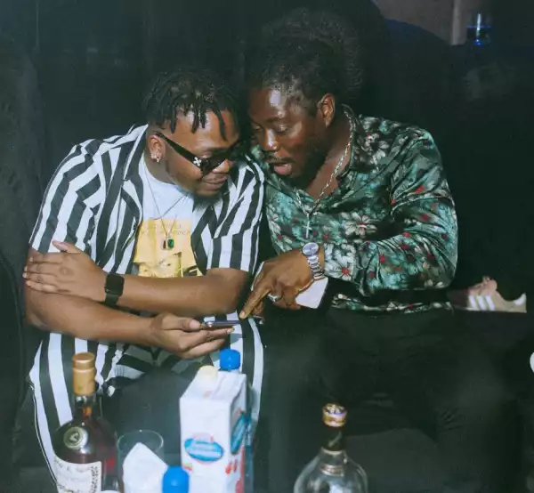 Rapper Olamide Pictured With Daddy Showkey
